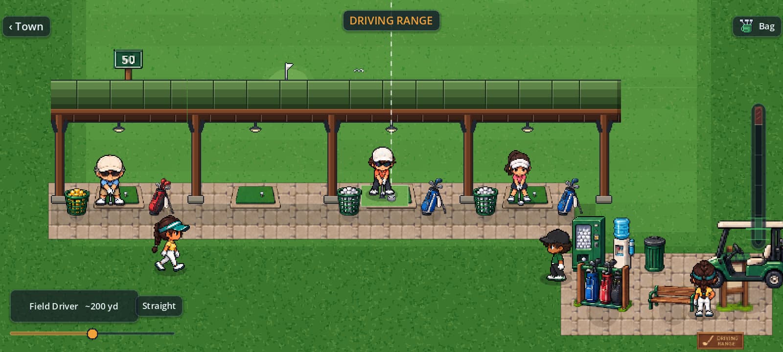 Top-down view of covered driving-range bays; three golfers stand on mats with ball baskets and bags beside them.